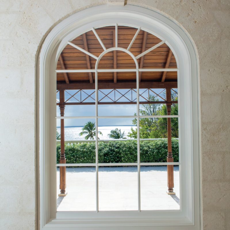 teak arched fixed window